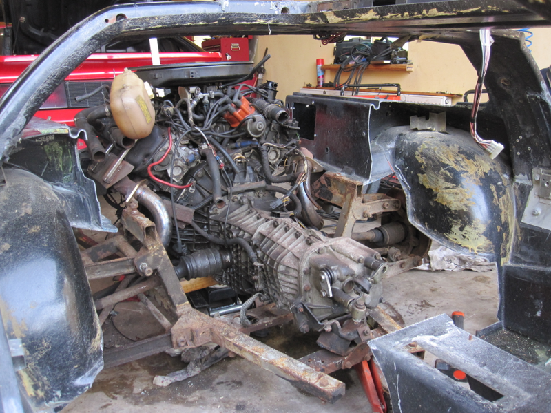 Seeing how the Renault Alpine GTA rear components fit inside the DMC-12 body using the cut-up test shell.